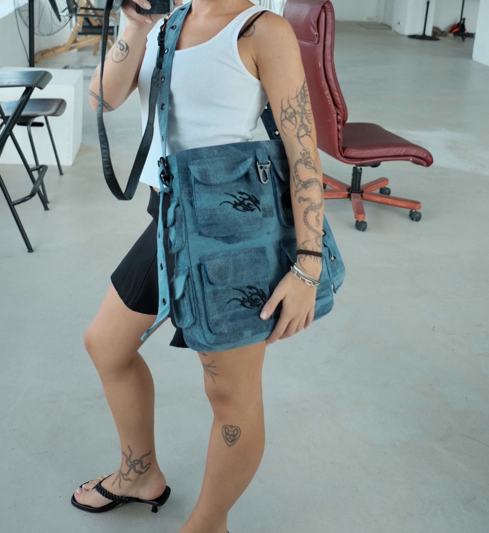 Keychain Cargo Bag XL - Ocean with tribal embroidery and multiple pockets, displayed on a plain background.