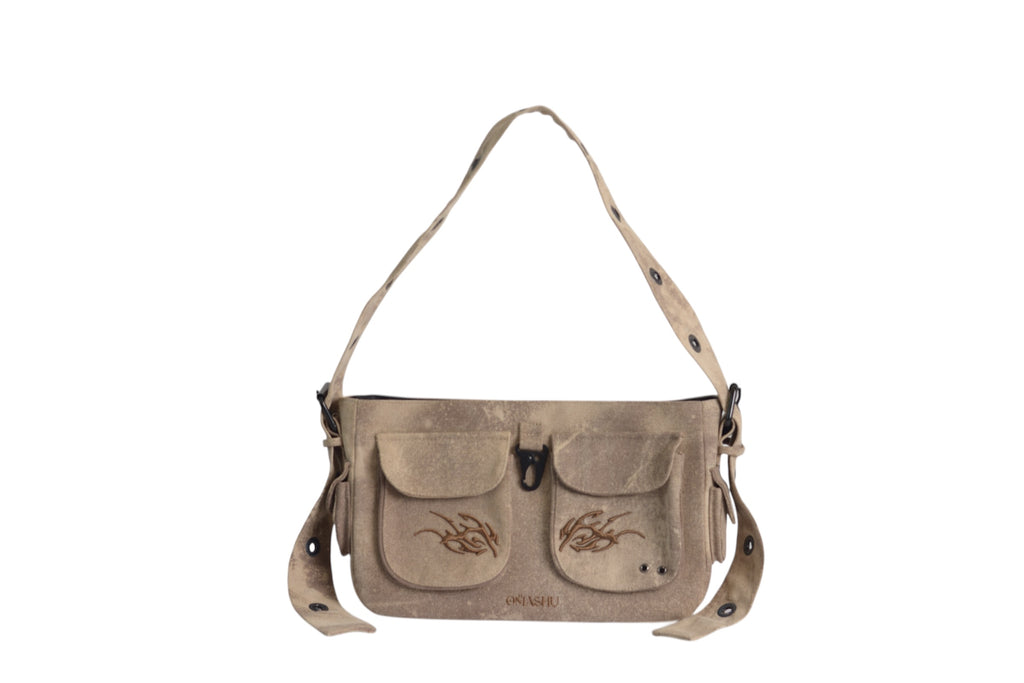 beige embroidered bag