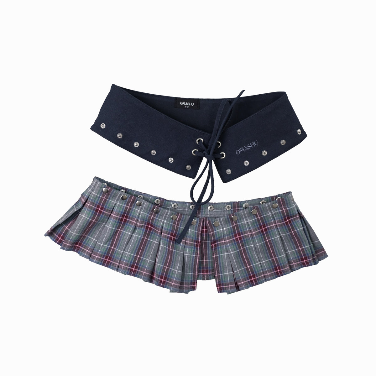 A navy suede belt with a detachable skirt featuring a plaid pattern. The belt has snap buttons for attachment, and the skirt is designed with a pleated style.